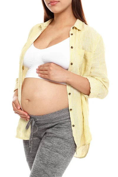 Fiatal terhes nő pólóban, fehér alapon, Vértes — Stock Fotó