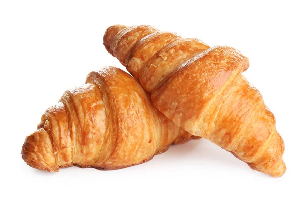 Croissant freschi e gustosi su sfondo bianco. Pasticceria francese — Foto Stock