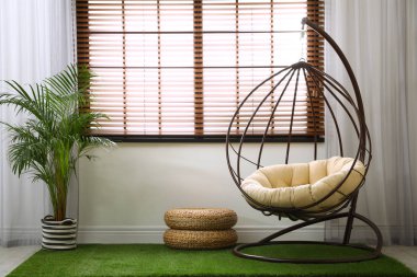 Salıncak sandalyeli şık ve modern oda iç mekan