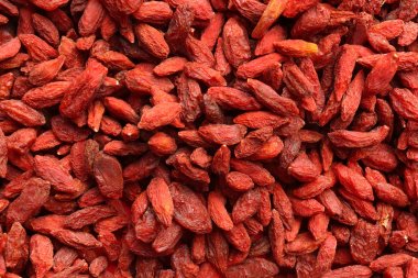Arka plan olarak birçok kurutulmuş goji çilek, closeup. Sağlıklı superfood