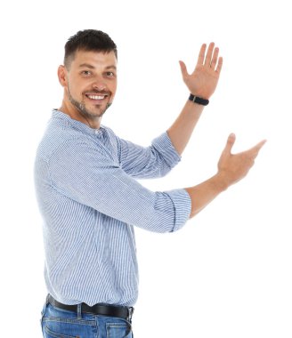 Profesyonel iş eğitmeni beyaz arka plan üzerinde bir şey gösteren