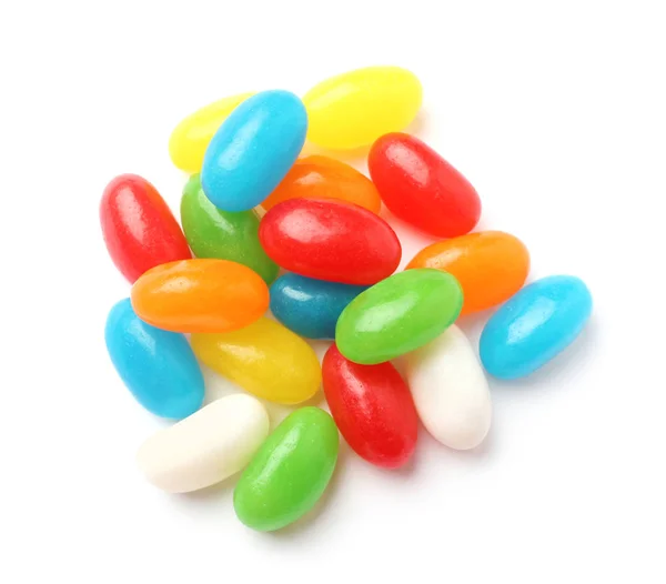 Pile of tasty bright jelly beans isolated on white, top view — Stock Photo, Image