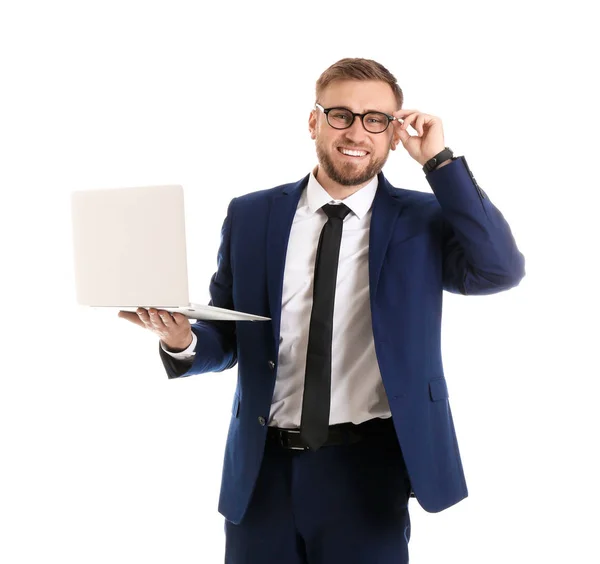 Happy young business holding laptop on white background — Stok Foto