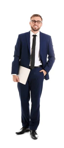 Happy young businessman holding laptop on white background — Stock Photo, Image