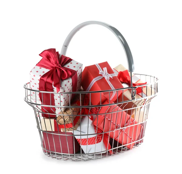 Shopping basket full of gift boxes on white background — Stock Photo, Image