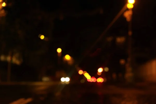 Dimsyn på nattstadsbilden med bokeh effekt — Stockfoto