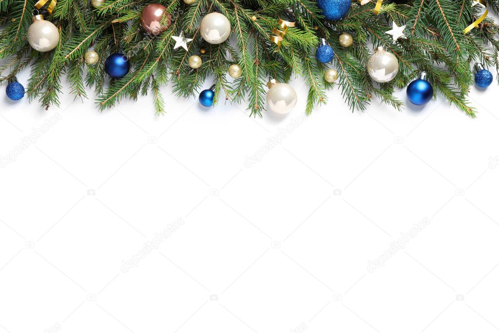 Fir branches with Christmas decorations on white background, flat lay
