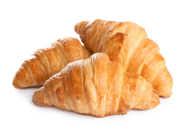 Croissant freschi e gustosi su sfondo bianco. Pasticceria francese — Foto Stock