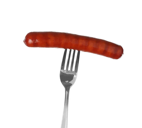 Delicious grilled sausage on fork against white background. Barbecue food — Stock Photo, Image