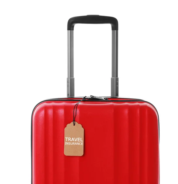 Valise rouge avec étiquette TRAVEL INSURANCE sur fond blanc — Photo