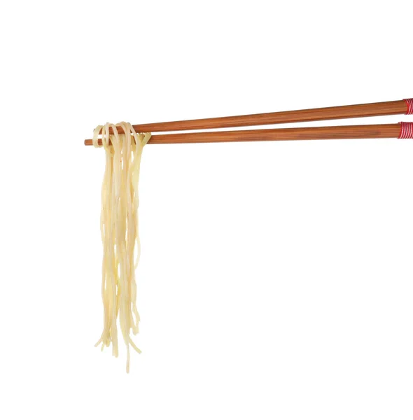 Chopsticks with tasty cooked Asian noodles isolated on white — Stock Photo, Image