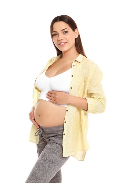 Portrait of beautiful young pregnant woman in shirt on white background — Stock Photo, Image