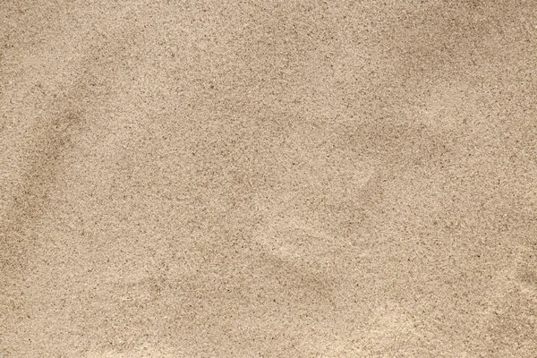 Вид на золотой пляжный песок на фоне — стоковое фото