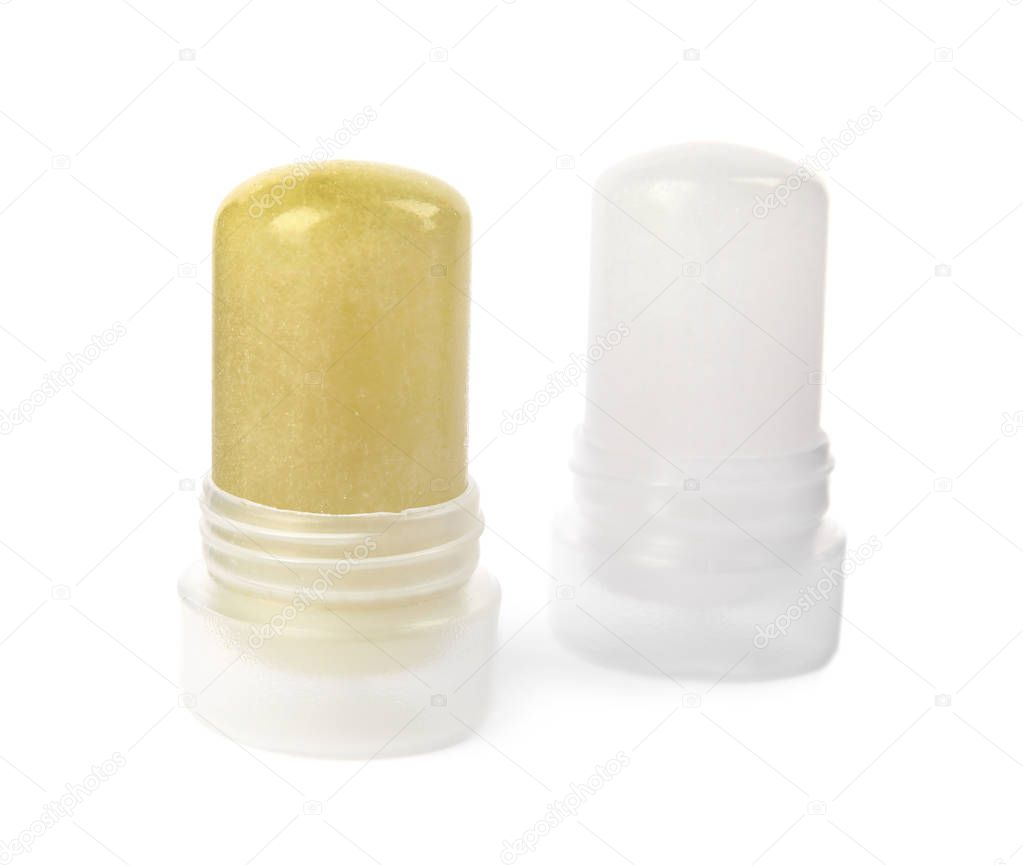 Natural crystal alum stick deodorants on white background