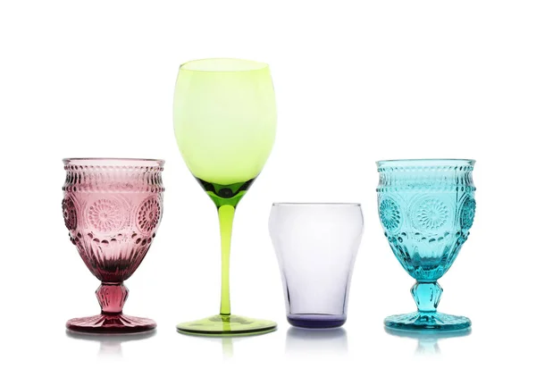 Set of colorful empty glasses on white background — Stock Photo, Image