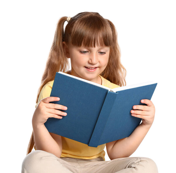 Portrait of cute little girl reading book on white background