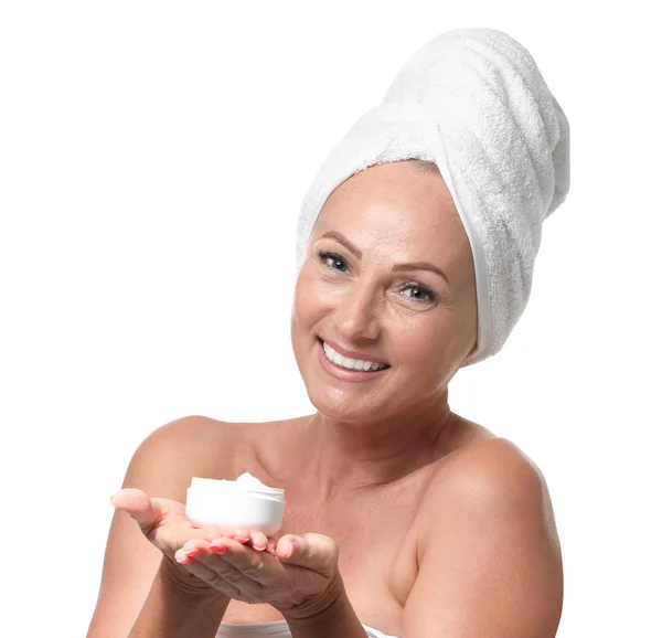 Portrait of beautiful mature woman with perfect skin holding jar of cream on white background — Stock Photo, Image