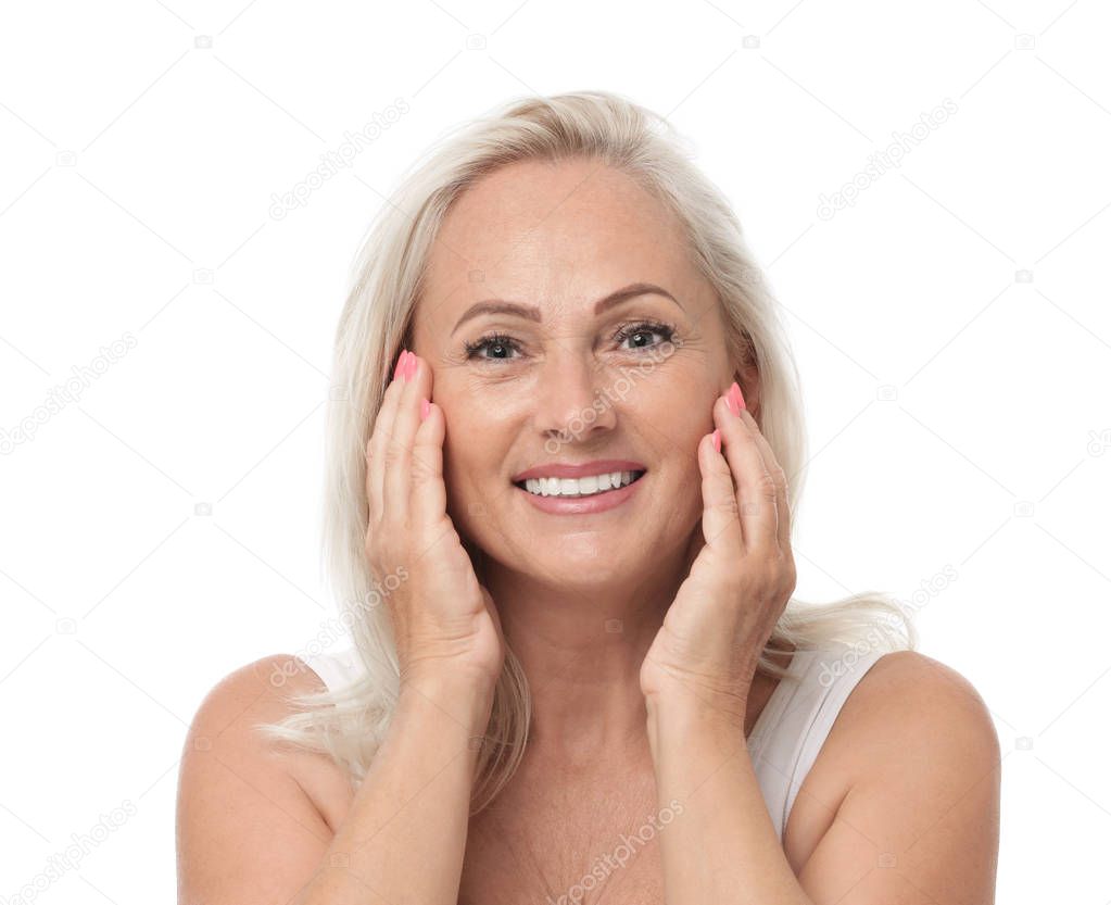 Portrait of beautiful mature woman with perfect skin on white background