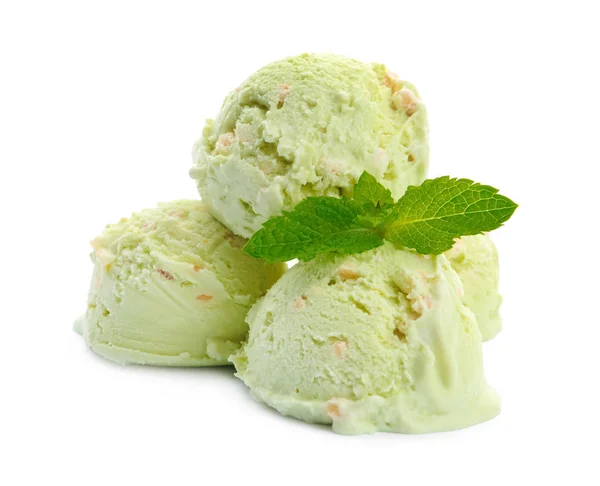 Scoop di delizioso gelato al pistacchio con menta su sfondo bianco — Foto Stock