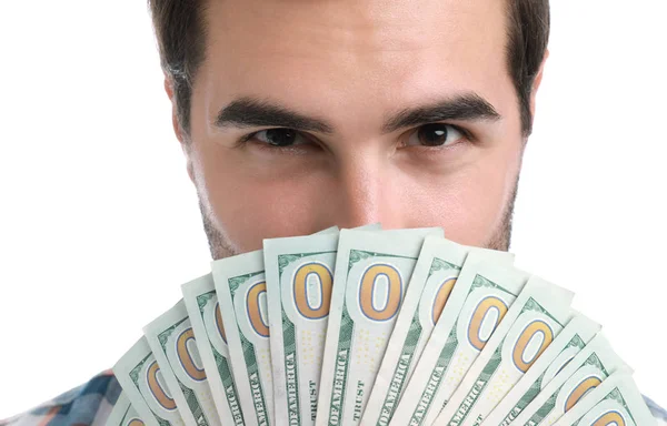 Beyaz arka plan üzerinde dolar ile Yakışıklı genç adam — Stok fotoğraf