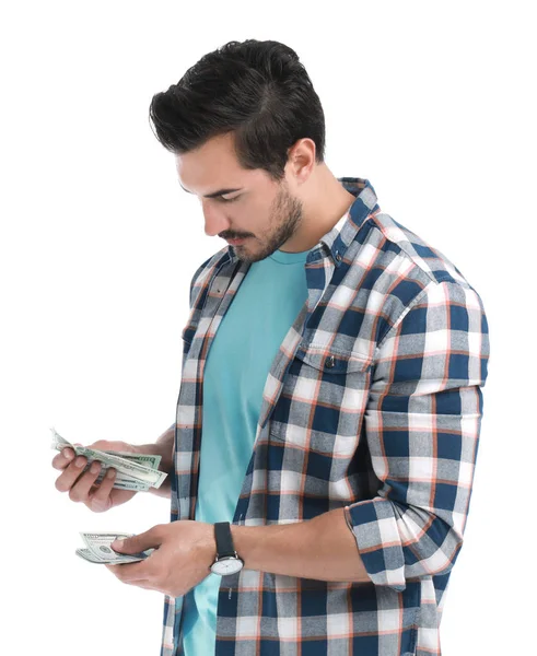 Handsome young man counting money on white background — Stock Photo, Image