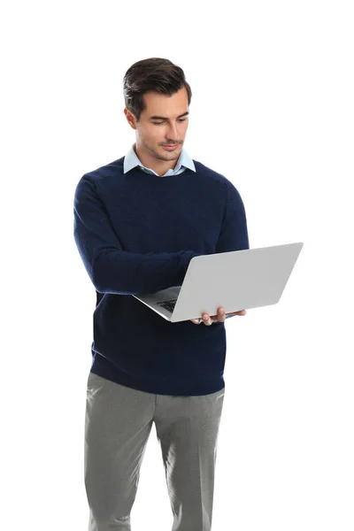 Ung manlig lärare med laptop på vit bakgrund — Stockfoto