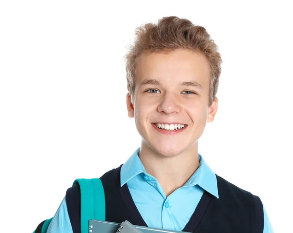 Щасливий хлопчик у шкільній формі на білому тлі — стокове фото