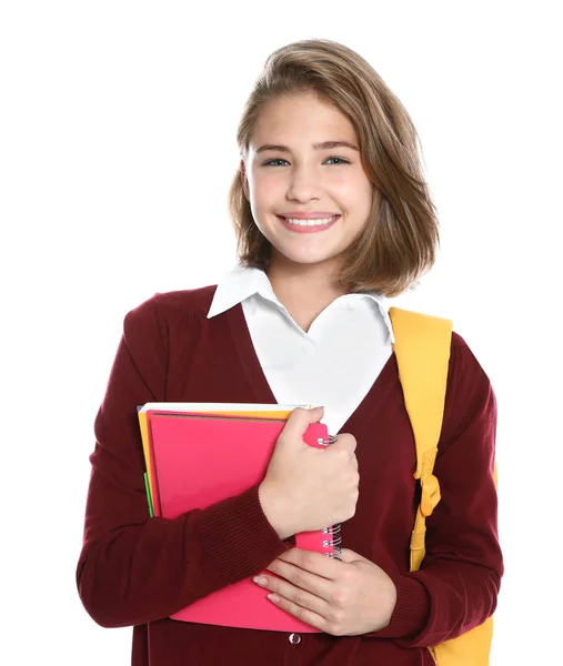 Gelukkig meisje in school uniform op witte achtergrond — Stockfoto
