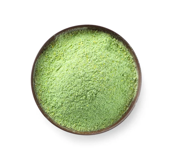 Beyaz arka plan üzerinde buğday çim tozu ile Kase, üst görünümü