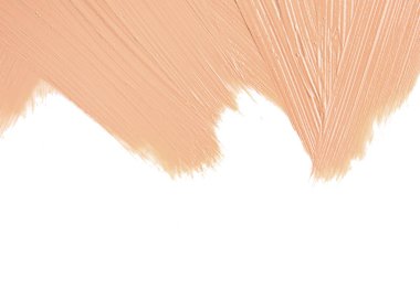 Beyaz arka plan üzerinde sıvı temel, üst görünüm. Makyaj ürünü