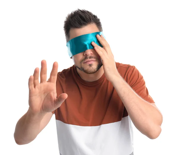 Man with light blue blindfold on white background — Stock Photo, Image