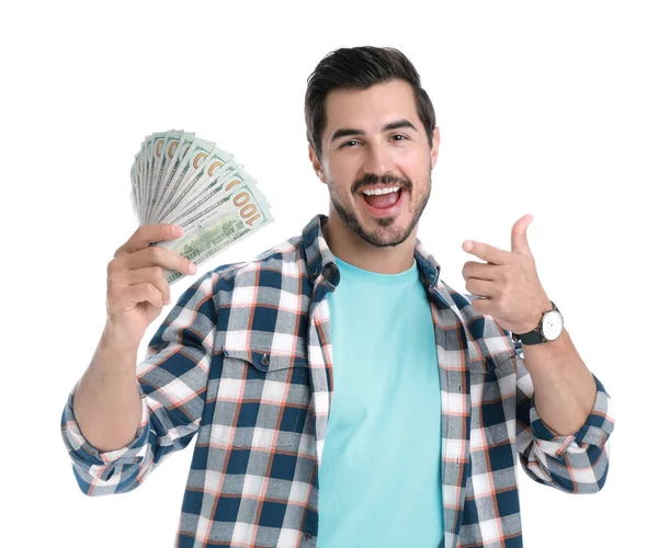 Handsome young man with dollars on white background — Stock Photo, Image