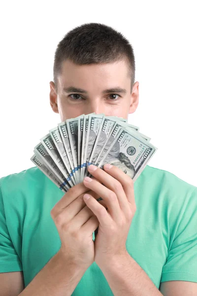 Красивый молодой человек с долларами на белом фоне — стоковое фото