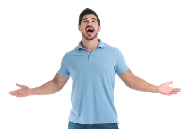 Joven feliz con las manos en alto sobre fondo blanco — Foto de Stock