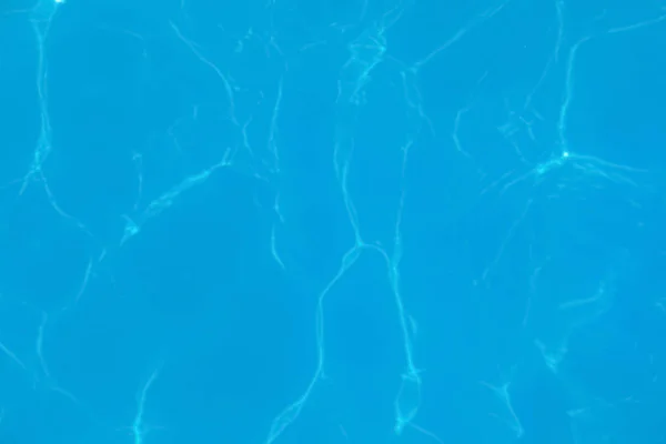 Zwembad water als achtergrond, bovenaanzicht — Stockfoto