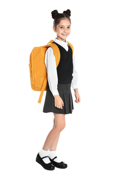 Chica feliz en uniforme escolar sobre fondo blanco —  Fotos de Stock