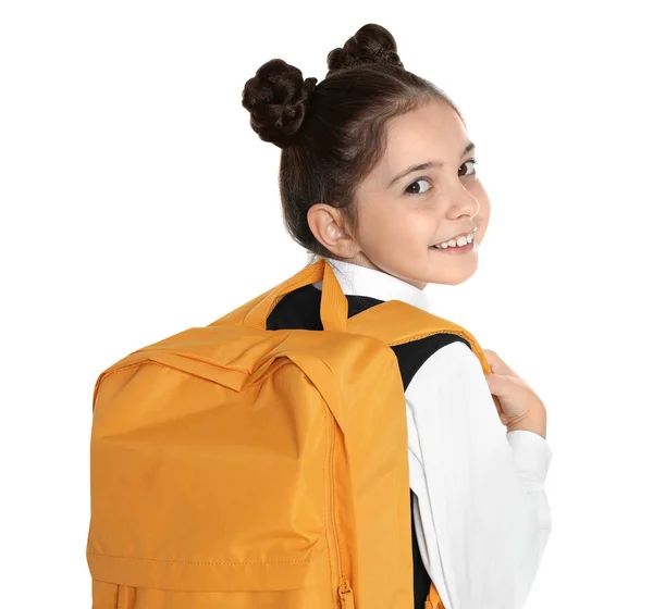 Menina feliz no uniforme da escola no fundo branco — Fotografia de Stock