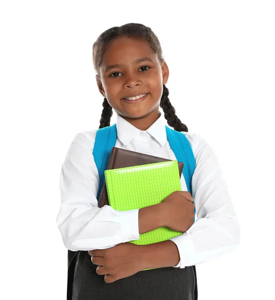 Menina afro-americana feliz em uniforme escolar no fundo branco — Fotografia de Stock