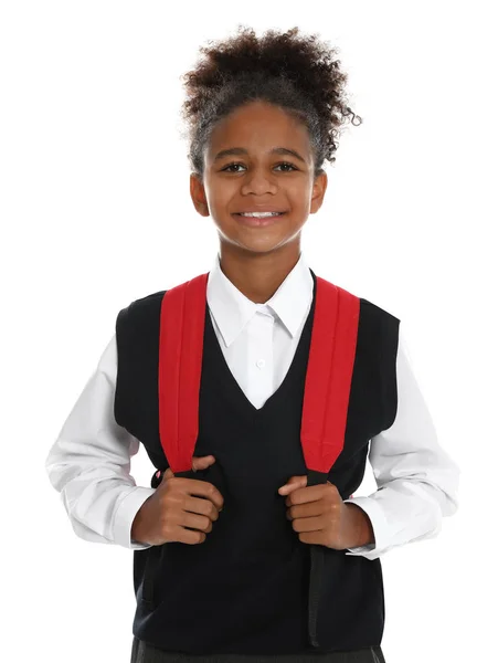 Chica afroamericana feliz en uniforme escolar sobre fondo blanco — Foto de Stock