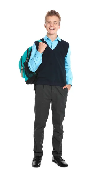 Niño feliz en uniforme escolar sobre fondo blanco —  Fotos de Stock