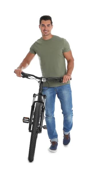 Όμορφος νέος άντρας με μοντέρνο ποδήλατο σε λευκό φόντο — Φωτογραφία Αρχείου