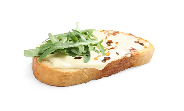 Slice of bread with spread and arugula on white background — Stock Photo, Image
