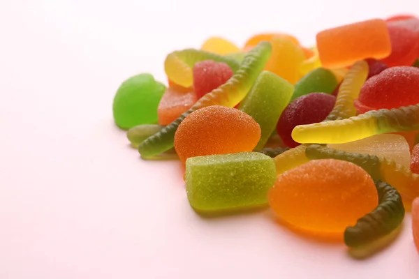 Pile of colorful jelly candies on pink background — Stock Photo, Image