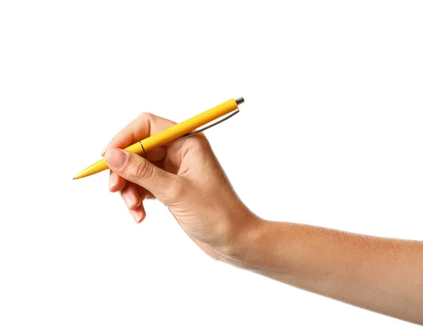 Молода жінка тримає ручку на білому тлі, крупним планом — стокове фото