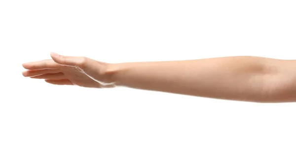 Νεαρή γυναίκα κρατώντας το χέρι της σε λευκό φόντο, κοντινό πλάνο — Φωτογραφία Αρχείου