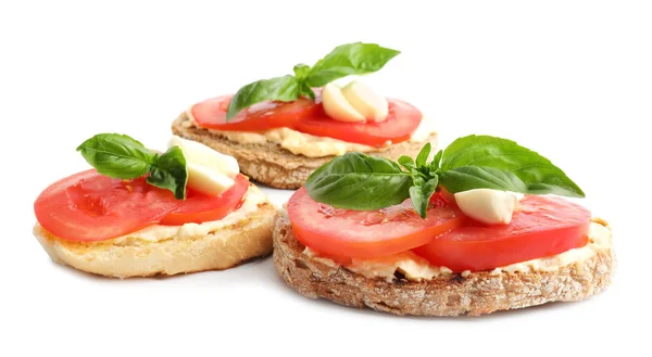 Tasty fresh tomato bruschettas on white background — Stock Photo, Image