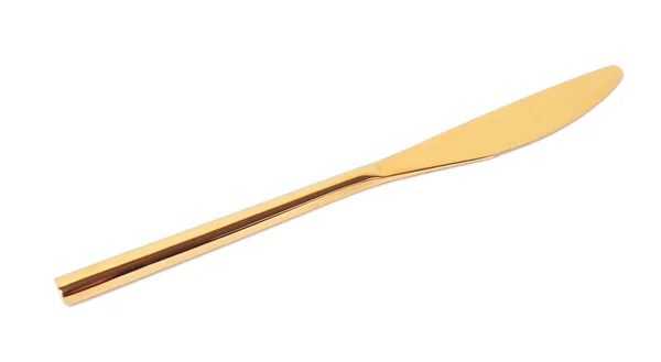 Elegante cuchillo de oro limpio sobre fondo blanco — Foto de Stock