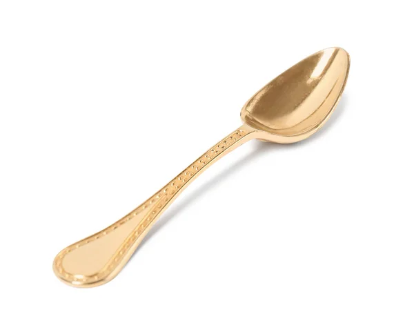 Elegante cucchiaio d'oro pulito su sfondo bianco — Foto Stock