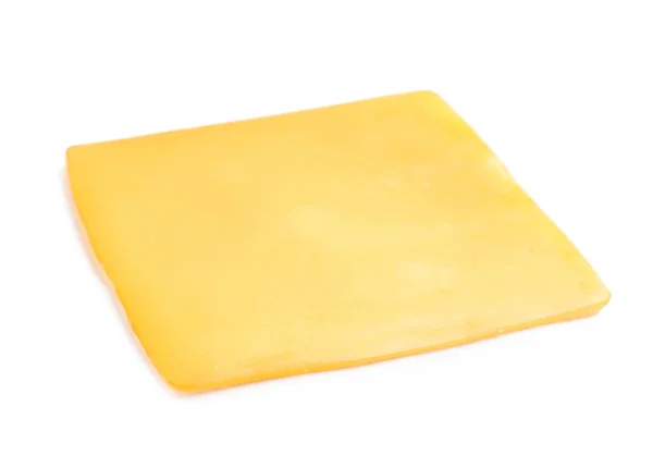 Slice of tasty cheese on white background — Stock Photo, Image