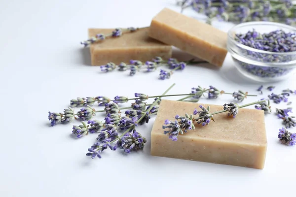 Hand made soap bars with lavender flowers on white background Royalty Free Stock Images